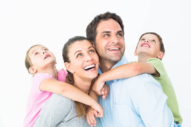 Portrait of a smiling family outdoors at home