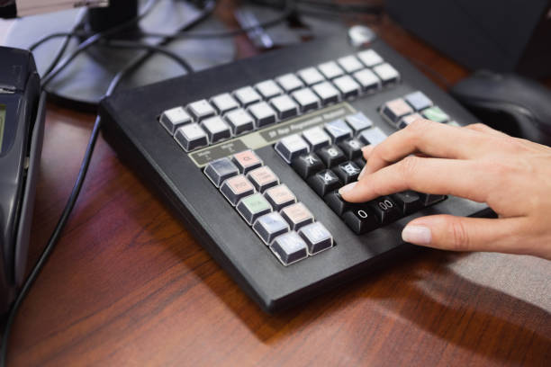 istock Close up view of woman using machine 691811256