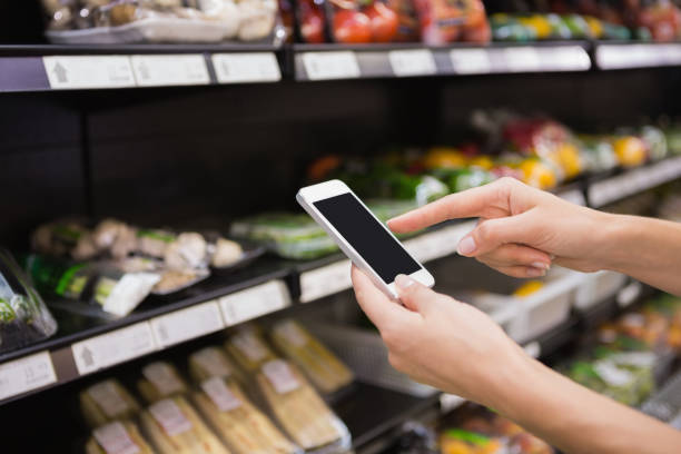istock Woman buy products and using his smartphone 691812708