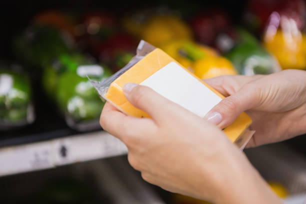 istock A pretty blonde woman buying some cheddar 691814306