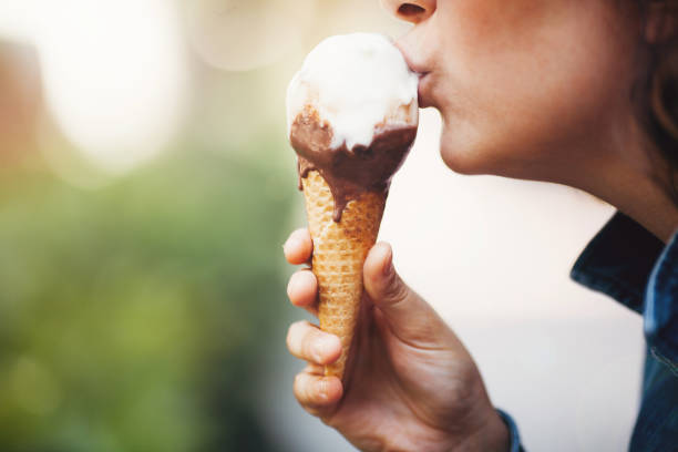 istock Woman with ice cream 691818792