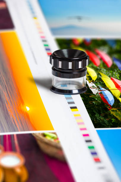 istock Color patch bars on offset print sheet and magnification loupe 691819132