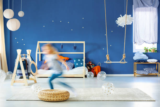 istock Child bedroom with blue wall 691826440