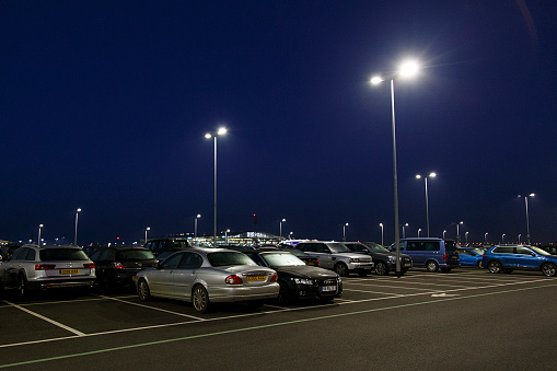 Heathrow Airport, London: April 07, 2017: Cars parked at London Heathrow Airport in the long stay parking lot. They will be secure here from damage or theft.