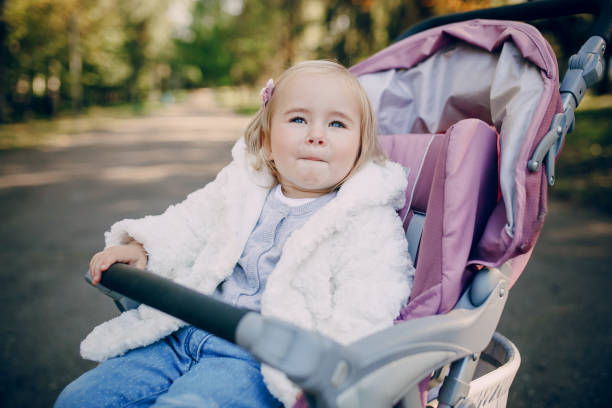 istock young family walking in the park 691833642