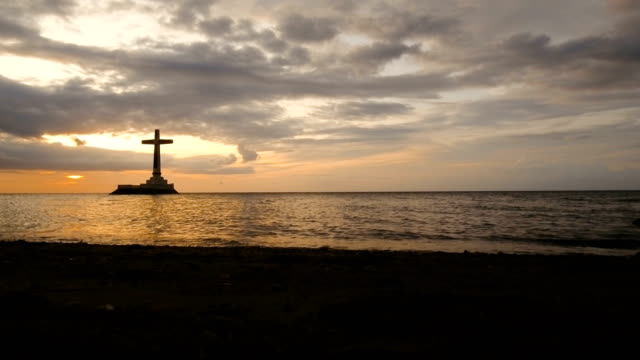 Catholic cross in the sea