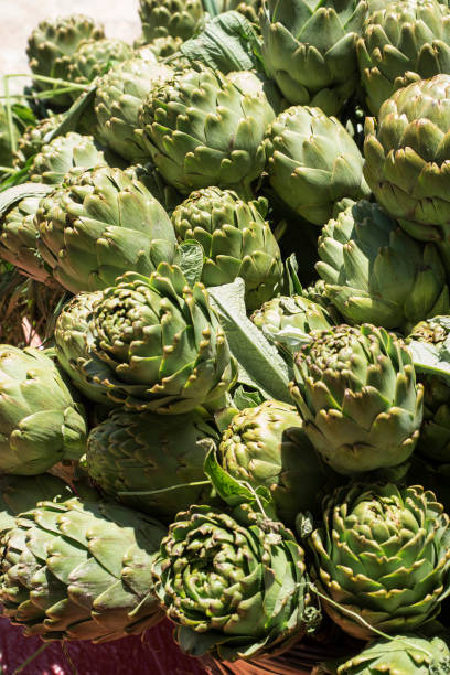 istock Background of fresh artichokes 691860458