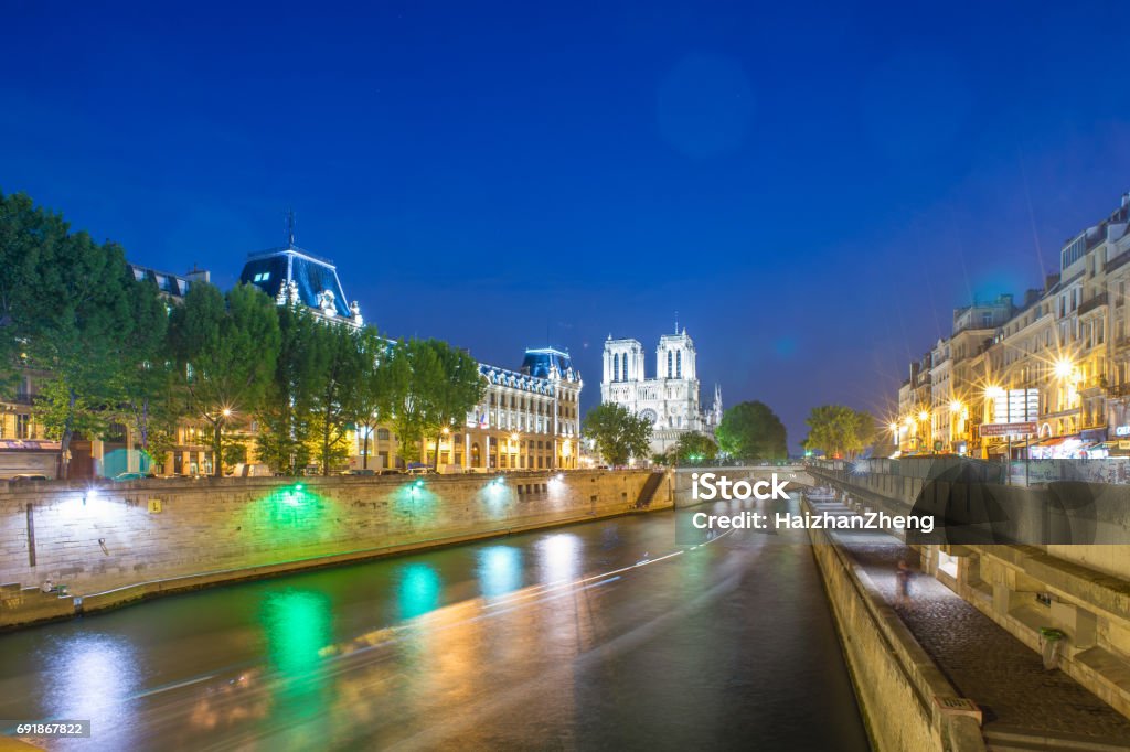 Notre Dame de Paris at night, Paris, France Capital Cities, Cathedral, Church, Europe, Famous Place Architectural Dome Stock Photo