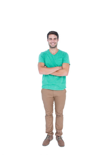 istock Handsome man looking at camera with arms crossed 691872072