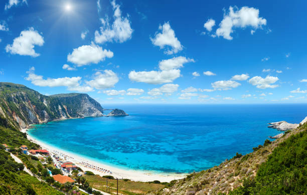 istock Petani Beach summer panorama (Kefalonia, Greece). Deep blue sky with cumulus clouds and sunshine. 691876062