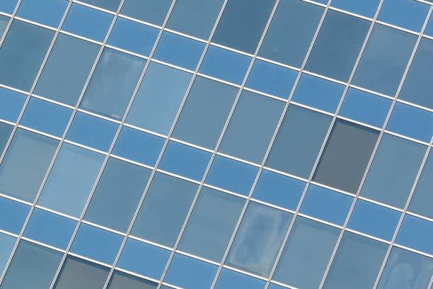 Close-up bottom view of glass skyscraper stock photo