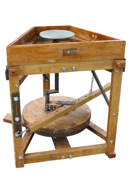 istock Brown wood potter's wheel isolated over white background 691878554
