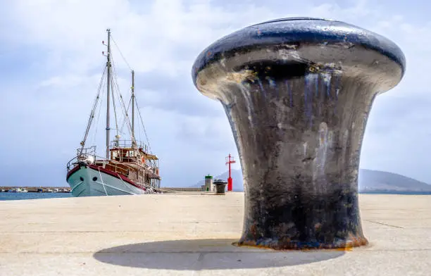 old two-master at a harbor