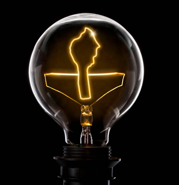 istock Lightbulb with a glowing wire in the shape of Benin (series) 691882334