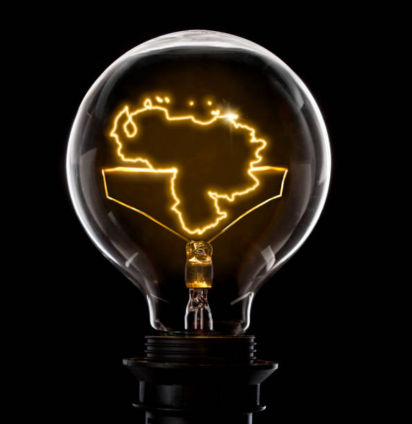 istock Lightbulb with a glowing wire in the shape of Venezuela (series) 691882538