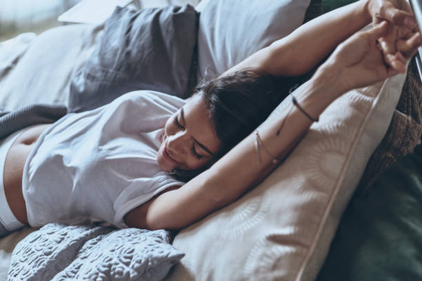 istock Happy girl in bed. 691882992