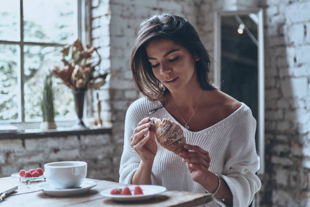 istock Enjoying fresh croissant. 691885866