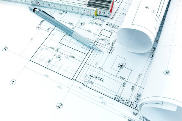 istock drawing and measurement tools, architectural plan, rolls of blueprints 691888614