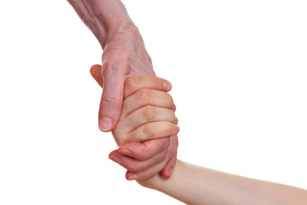 istock Old and young holding hands of each other 691890146