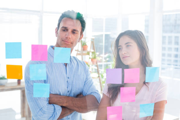istock Young creative business people looking at photo editor 691905392