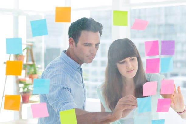 istock Young creative business people writing photo editor 691905710