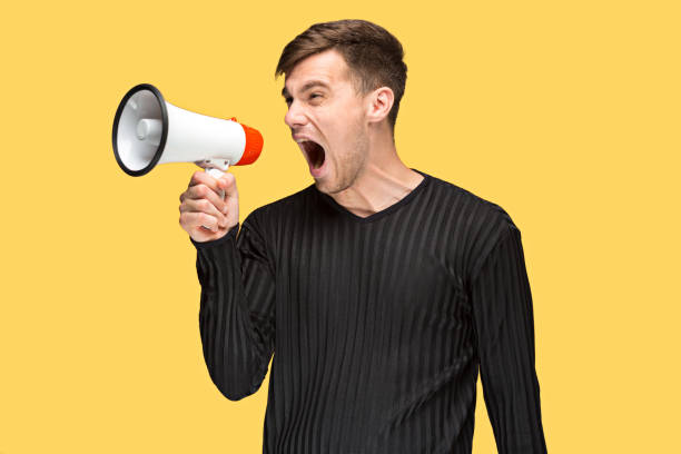 istock The young man holding a megaphone 691905798