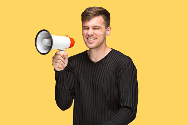 istock The young man holding a megaphone 691906046