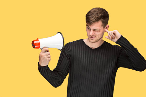 istock The young man holding a megaphone 691908380