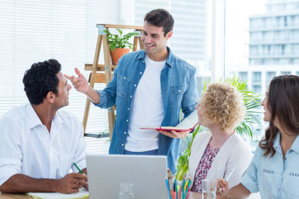 istock Group of young colleagues in a meeting 691910526