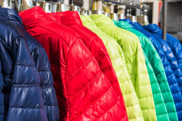 istock Winter clothes hanging at a store 691926942