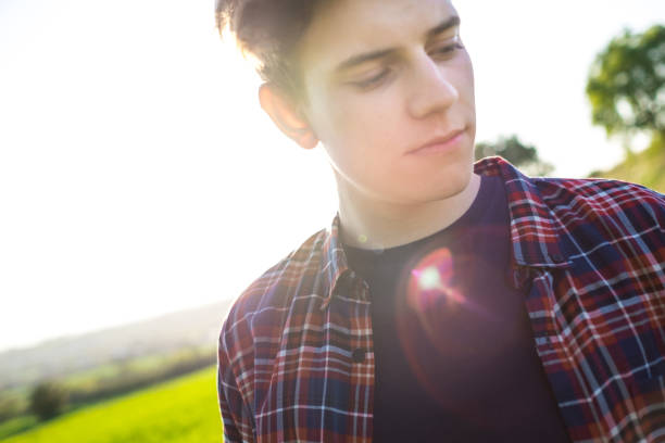 istock Thoughtful teenager under spring sun 691937532