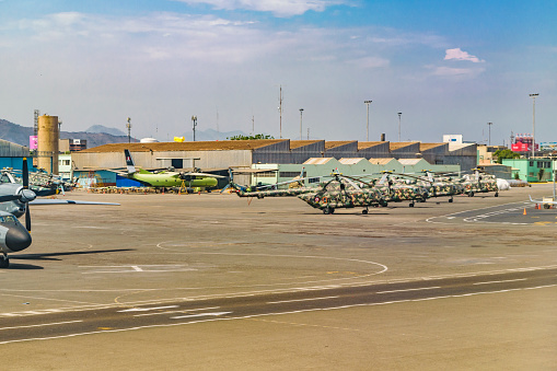 LIMA, PERU, APRIL - 2016 - Military helicpoters parked at Jorge Chavez airport in Lima city, Peru