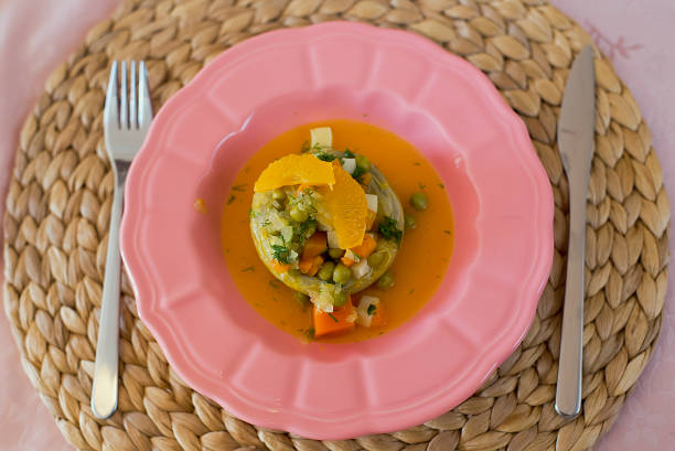 orange artischocke - artichoke artichoke heart salad portion stock-fotos und bilder