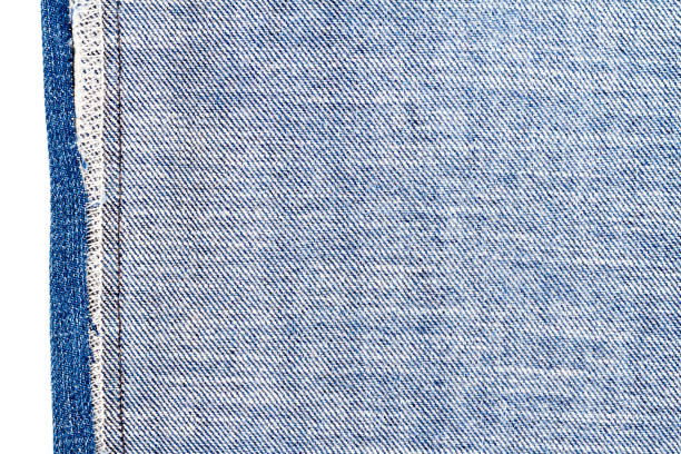 istock Piece of blue jeans fabric 691950618