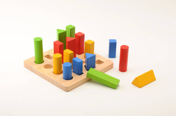 istock toy aligned wooden blocks multicolor bricks on white background 691953482