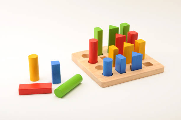 istock toy aligned wooden blocks multicolor bricks on white background 691955046