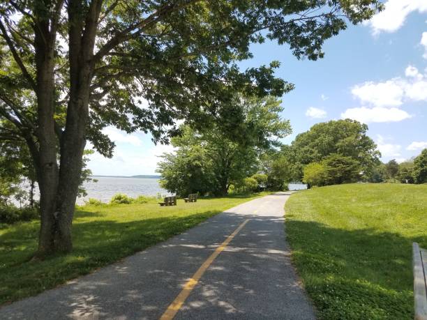 istock bench overlooking the Potomac river and bike path 691962156
