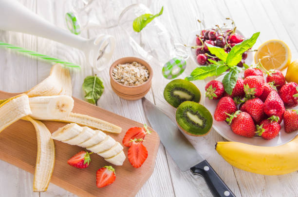 istock Cooking fruity smoothie 691962640