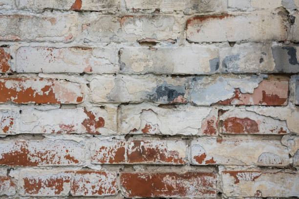 istock Fragment of whitewashed old brick wall, background 691969428