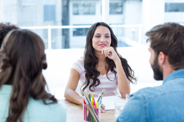 istock Cheerful creative business team in meeting 691981972