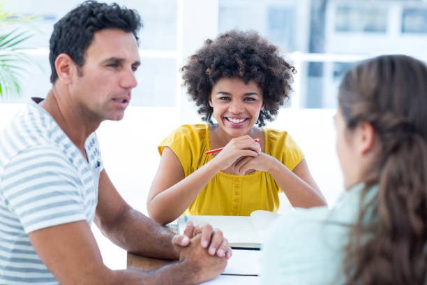 istock Cheerful creative business team in meeting 691984210