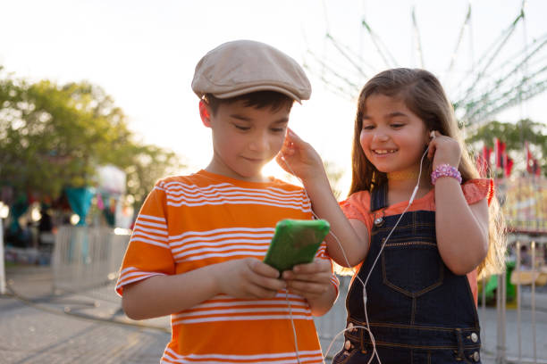 Sharing Headphones stock photo