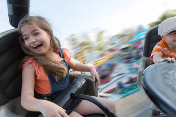 istock Children Riding a Carnival Ride 691988144