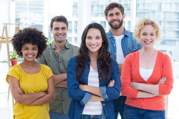 istock Group portrait of happy young colleagues 691988854