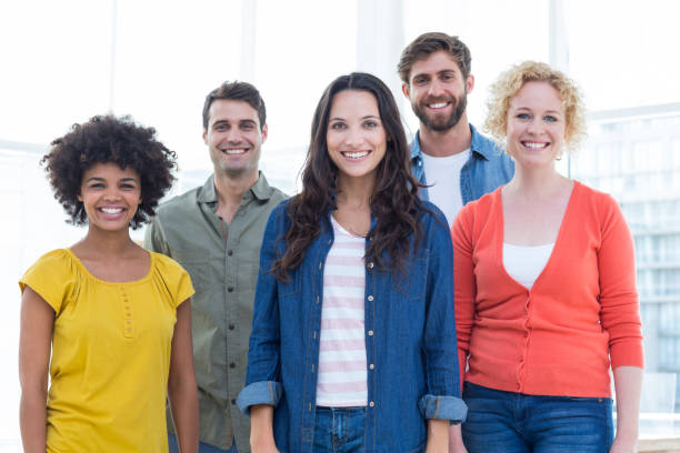 istock Group portrait of happy young colleagues 691988974