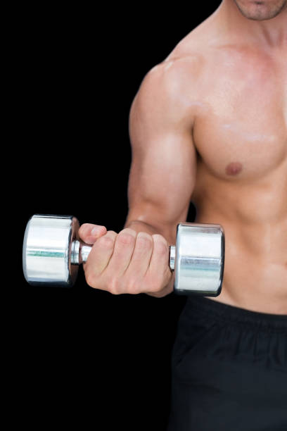 istock Strong crossfitter lifting up heavy dumbbell 691995554