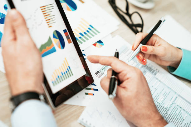 Investment advisors discussing about financial markets