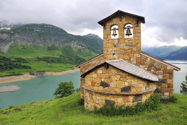istock French Alps: church on the mountain lake 692021986
