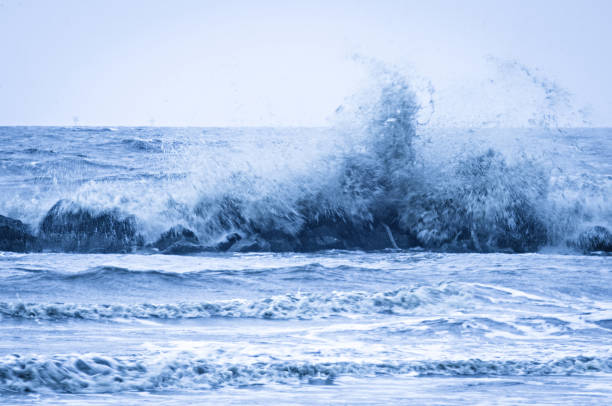 istock wave crashing into wavaebreaker on louisiana gulf coast 692026636