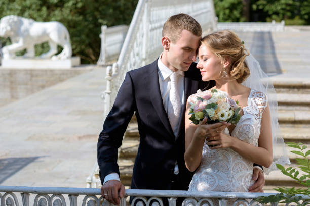 istock Wedding couple on the nature is hugging each other 692031896